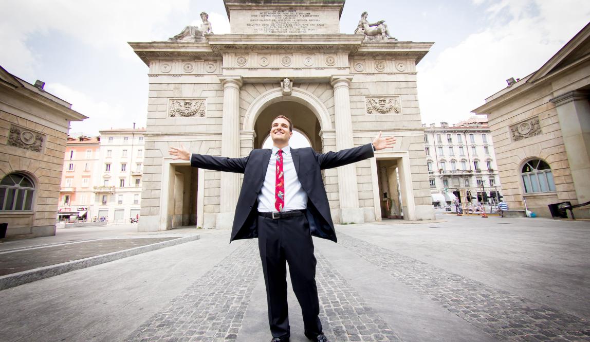student intern standing in front of Porta Garibaldi in Milan