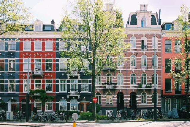 Classic Amsterdam buildings lining a street