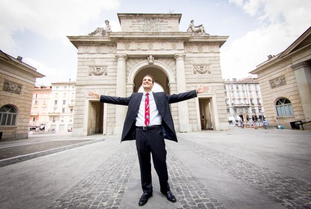 student intern standing in front of Porta Garibaldi in Milan