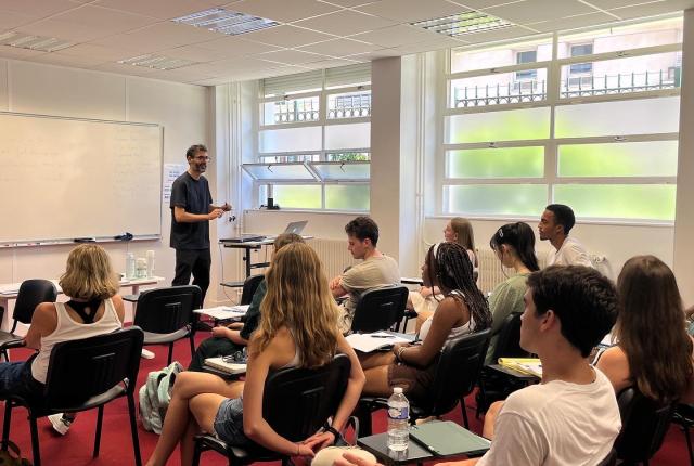 paris students in a classroom taking notes during a lecture