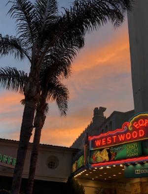 LA Westwood Village neon sign with sunset sky